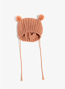 Hat with pompoms and ties