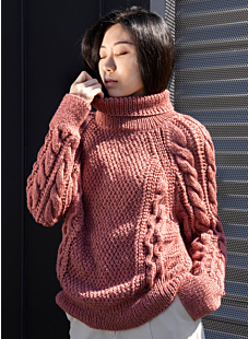 Raglan sweater with lacy cables