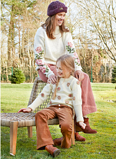 Sweater with crochet flowers