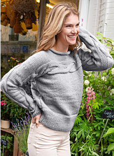 Cable roll neck sweater