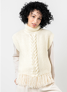 Poncho sweater with cables & fringe