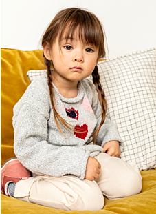 Rolled edge sweater with embroidered hearts